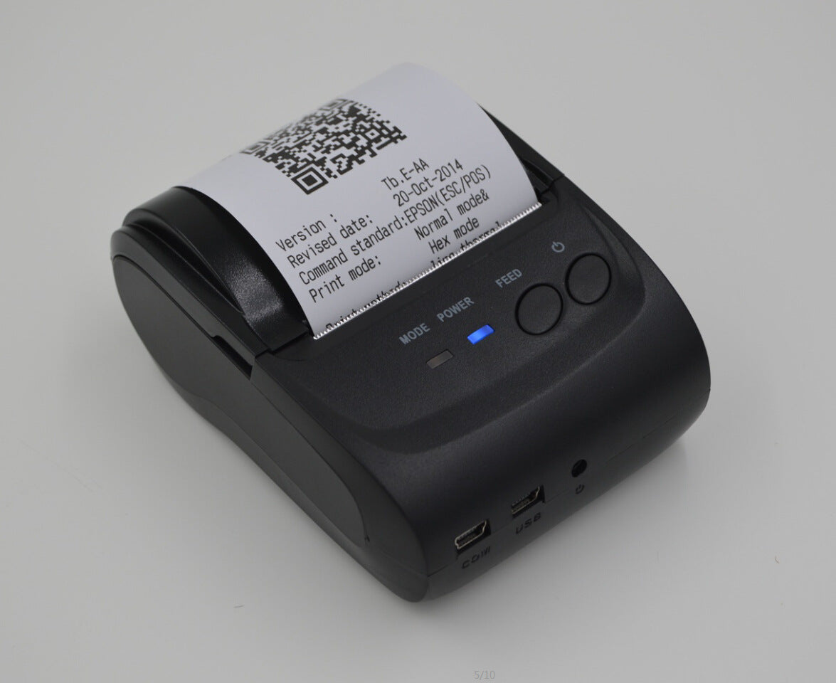 Portable Bluetooth thermal printer from Coremet Ltd, compact business kit with printing paper and connectivity features.