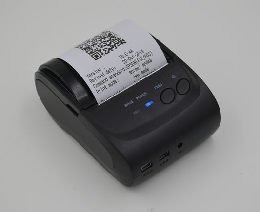 Portable Bluetooth thermal printer from Coremet Ltd, compact business kit with printing paper and connectivity features.