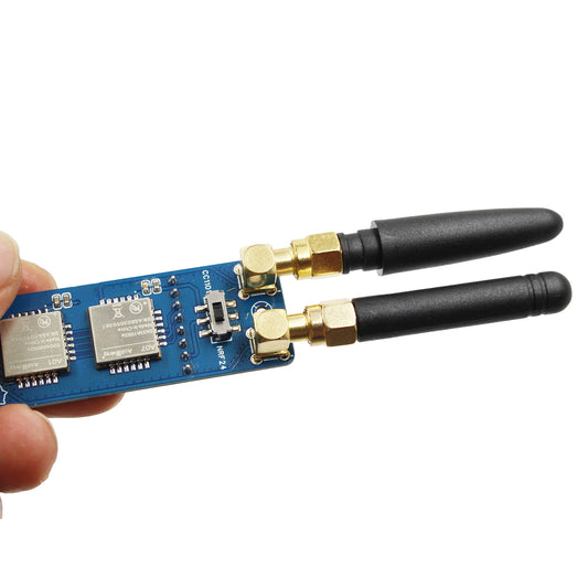 Compact M5StickC PLUS2 ESP32 IoT development module from Coremet Ltd, showing the small, integrated electronics board with USB port.