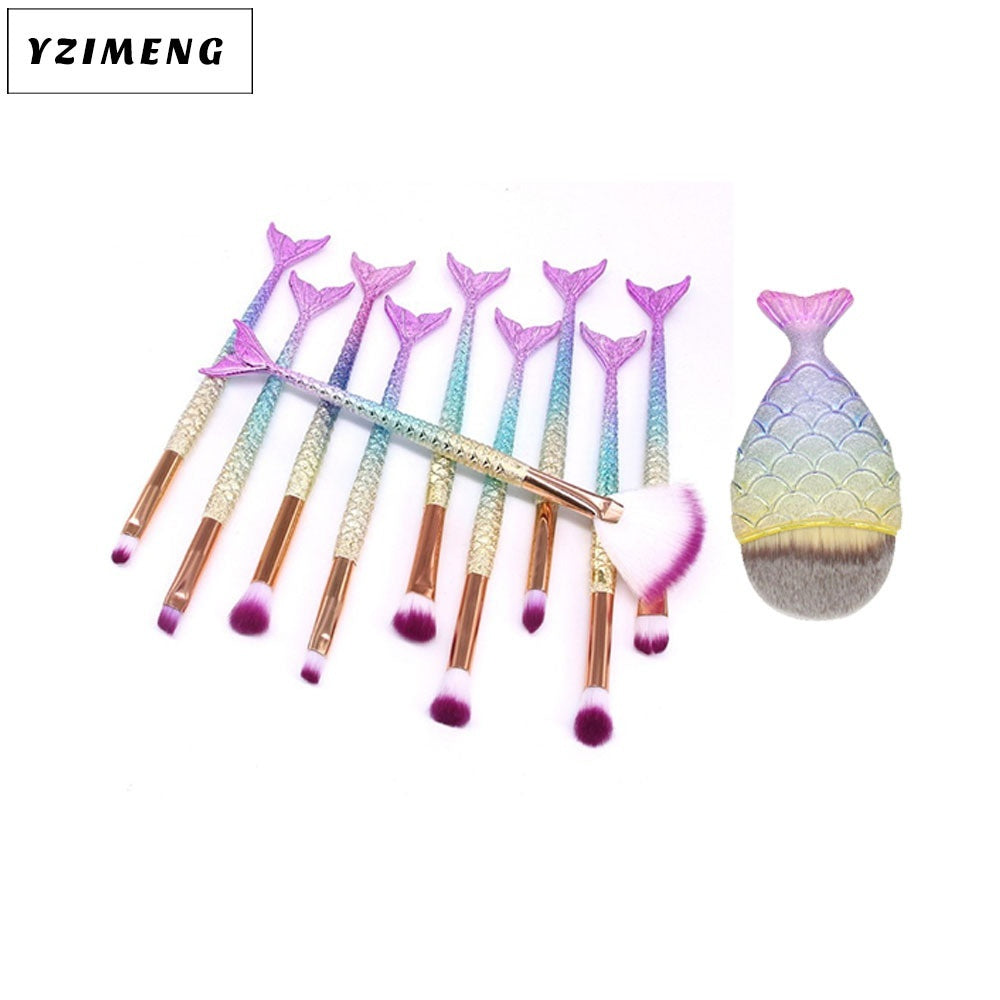 Set of 10 Mermaid-themed makeup brushes by Coremet Ltd, featuring colorful handles and soft bristle heads for beauty application.