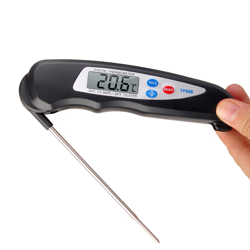 Coremet Ltd food thermometer from business kits, showing a digital display and stainless steel probe for accurate temperature readings.