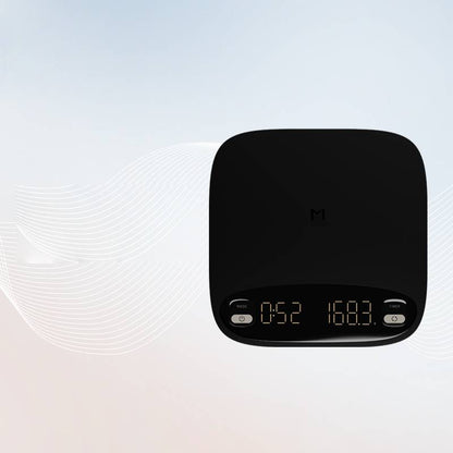 Coremet Ltd handcrafted precision coffee weighing scale for business kits, featuring a sleek digital display and stainless steel surface.