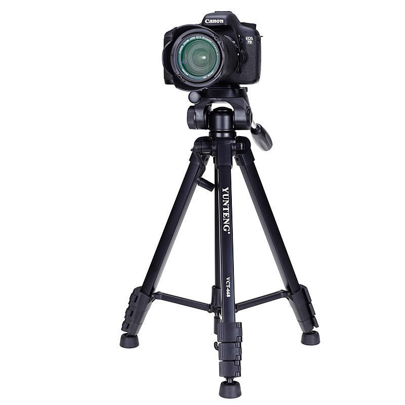 Coremet Ltd compatible Yunteng 668 tripod for Apple and SLR cameras, sturdy camera stand with adjustable legs for photography.