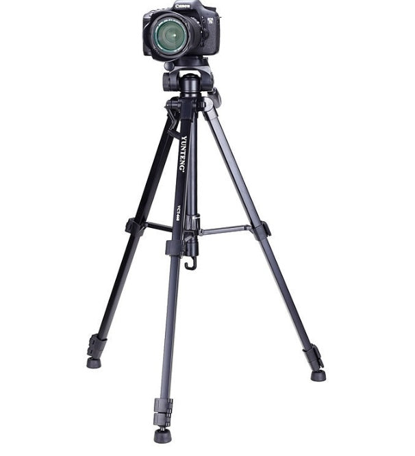 Coremet Ltd Yunteng 668 SLR camera tripod stand compatible with Apple devices, shown as part of a business kit setup.