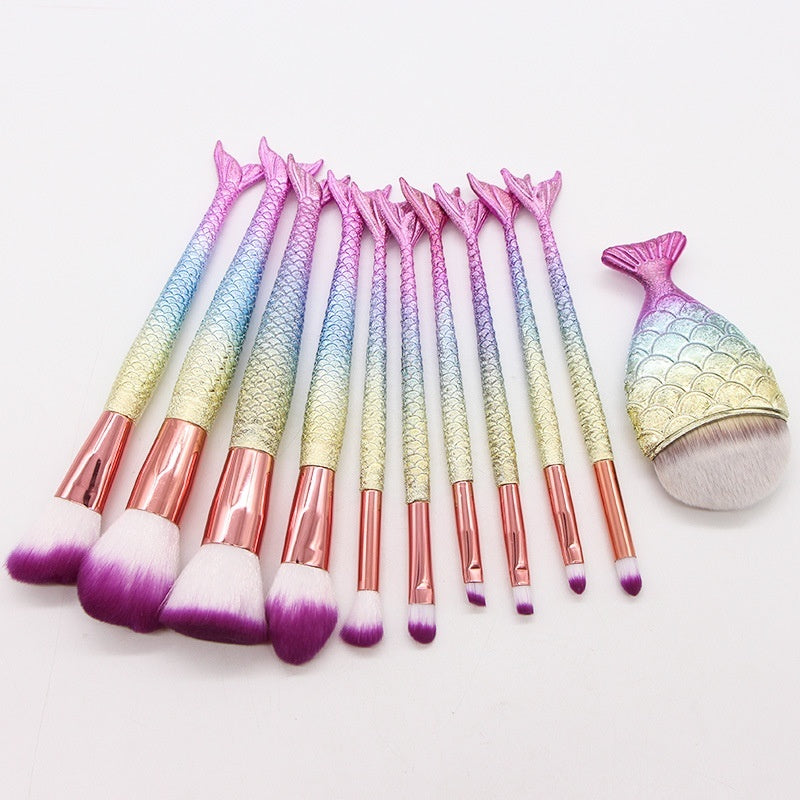 Set of 10 Mermaid-themed makeup brushes by Coremet Ltd, featuring colorful handles and soft bristles for beauty tools and makeup application.