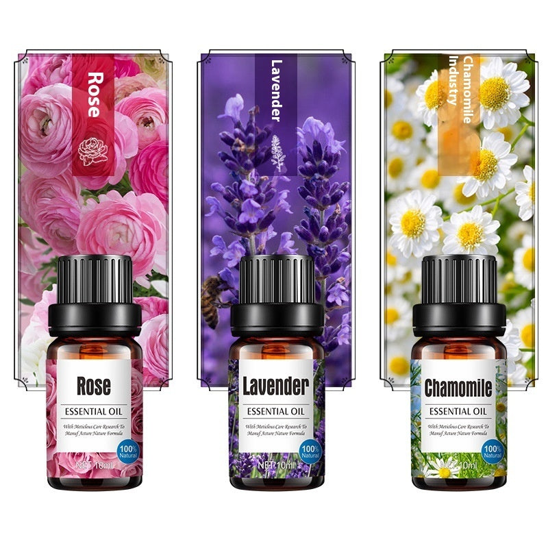 Aroma diffuser with 10ml bottle of sweet orange and lavender essential oils, ideal for home or office aromatherapy.