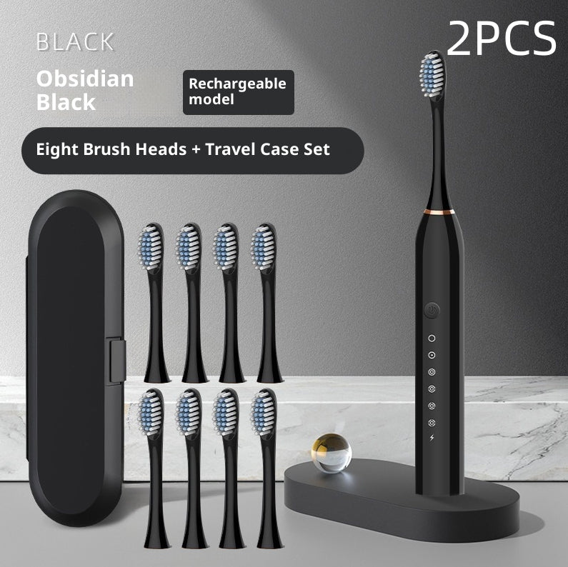 Coremet Ltd rechargeable automatic electric toothbrush with soft bristles, part of a professional business kit, ready for dental cleaning.