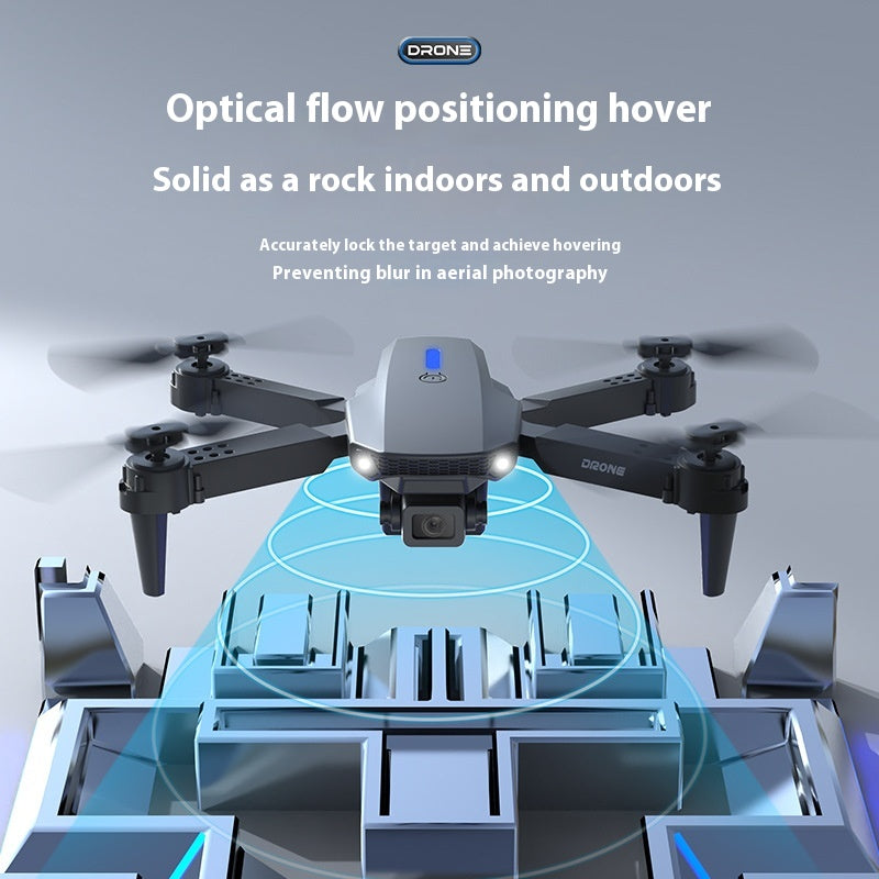 Foldable mini drone with aerial camera from Coremet Ltd, showcasing its compact design and camera lens for aerial photography.