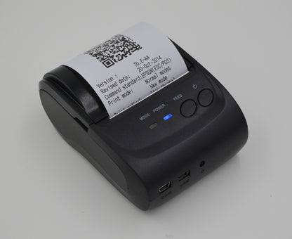 Portable Bluetooth thermal printer from Coremet Ltd, compact business kit with printing paper and connectivity features.