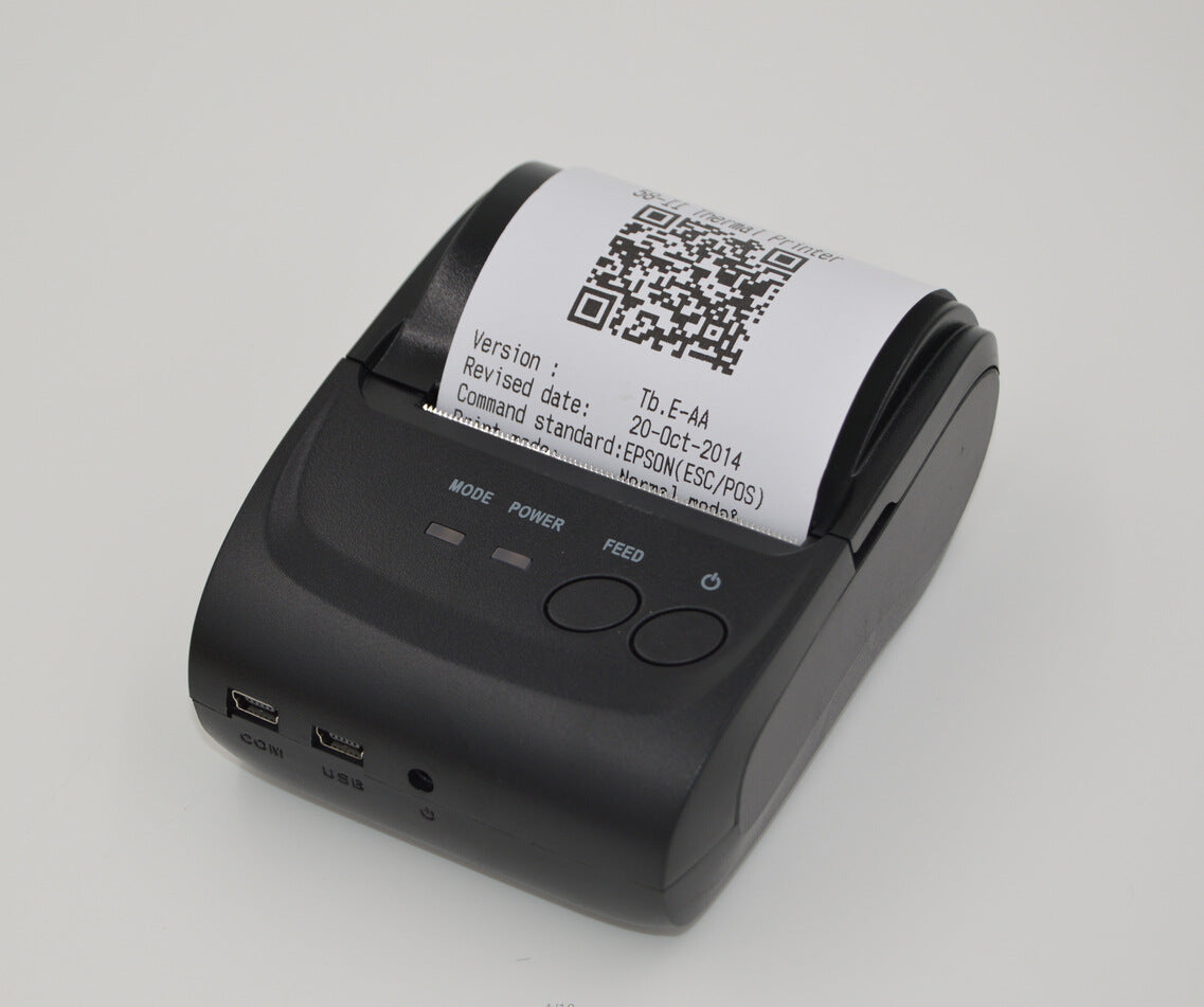 Portable Bluetooth thermal printer from Coremet Ltd, compact device for mobile receipt and label printing in business kits.