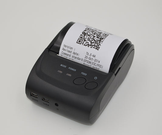 Portable Bluetooth thermal printer from Coremet Ltd, compact device for mobile receipt and label printing in business kits.
