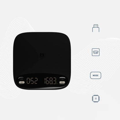 Coremet Ltd handcrafted precision coffee weighing scale from business kits, featuring a sleek digital display and stainless steel surface.