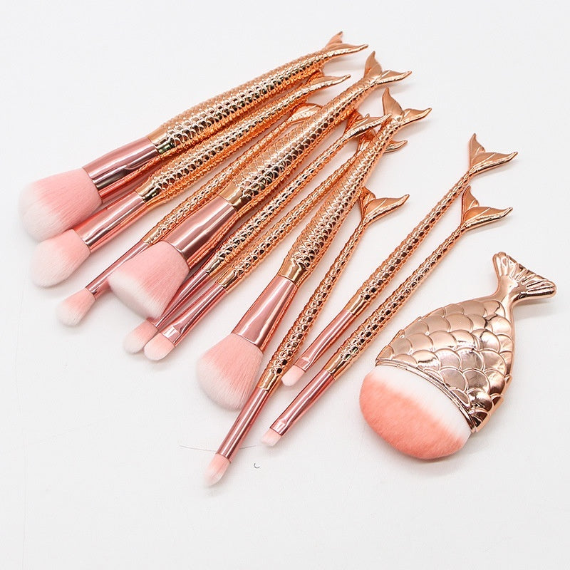 Coremet Ltd mermaid-themed makeup brushes business kit with 10 colorful brushes for beauty and professional makeup application.