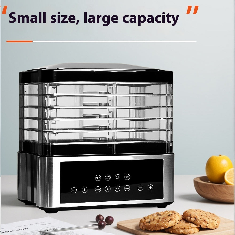 Stainless steel food dehydrator from Coremet Ltd, designed for drying fruits and snacks in a professional kitchen setup.