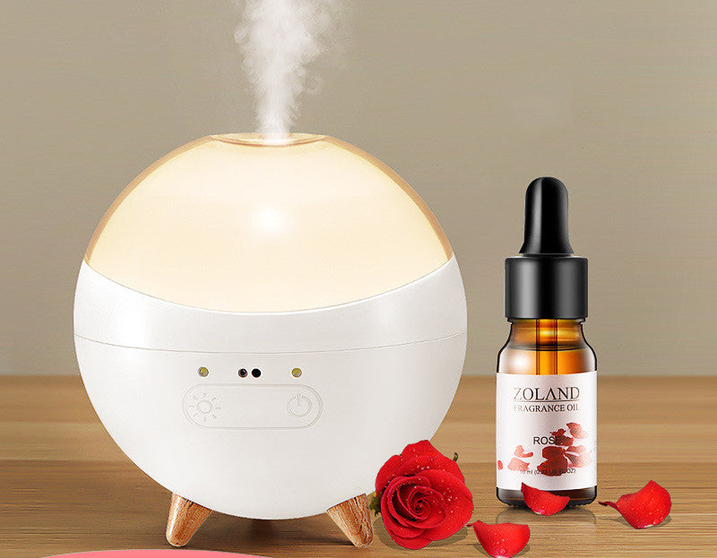 Coremet Ltd ultrasonic aroma diffuser and humidifier in a business kit, showing a sleek white device with mist and aroma diffuser features.
