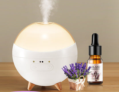 Coremet Ltd ultrasonic aroma diffuser and humidifier business kit showing sleek device with mist and essential oil tray.