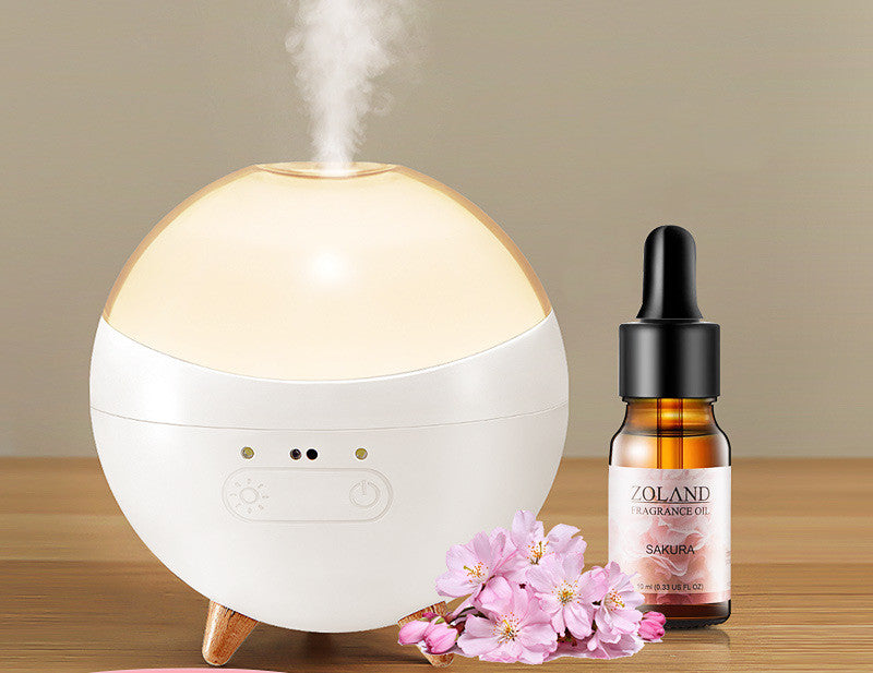 Coremet Ltd ultrasonic aroma diffuser and humidifier business kit with sleek design and multiple mist outlets on a white background.