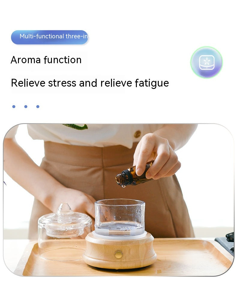 Glass water tank aroma diffuser business kit by Coremet Ltd with clear glass tank and aroma accessories.
