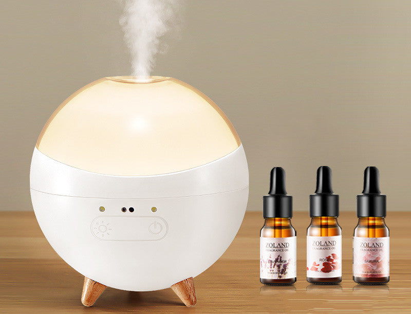 Coremet Ltd ultrasonic aroma diffuser and humidifier for business kits, showing sleek design and misting functionality.