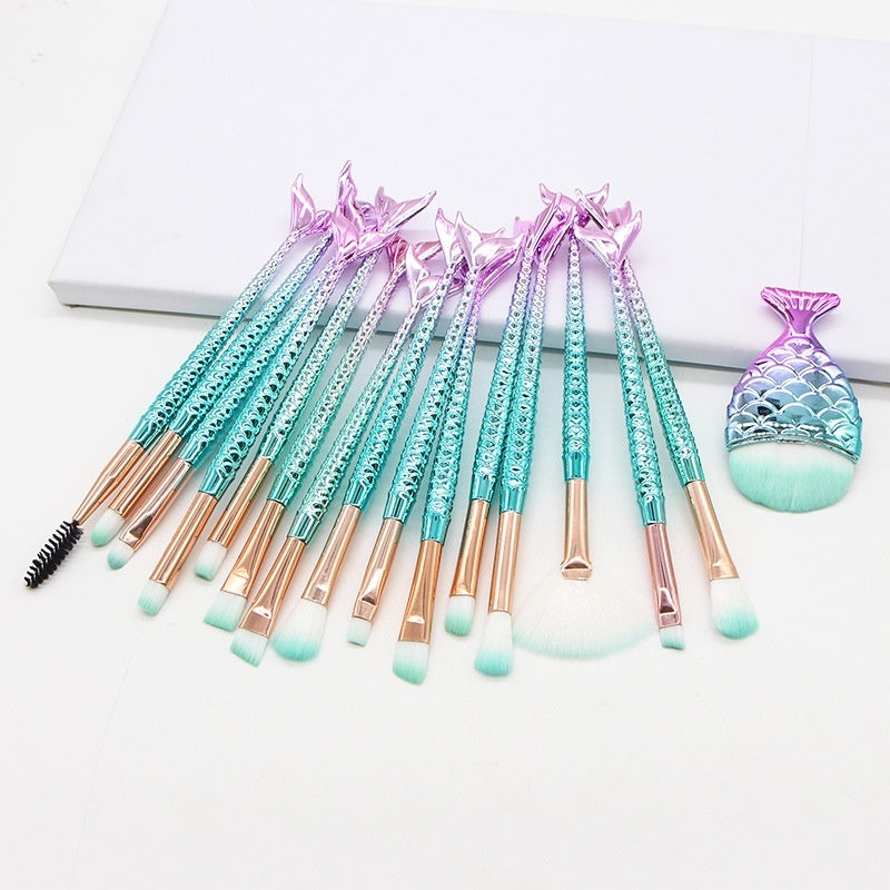 Set of 10 mermaid-themed makeup brushes from Coremet Ltd, featuring colorful handles and soft bristles for beauty tools.