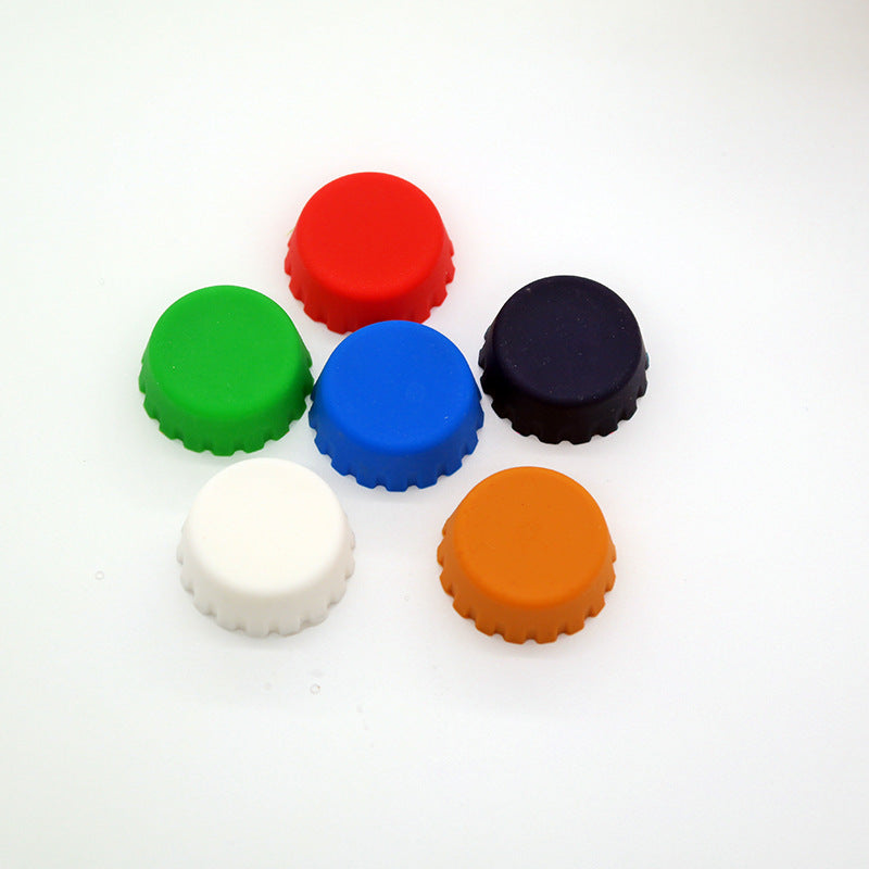 Food grade silicone bottle caps from Coremet Ltd Business Kits, shown in a close-up image with multiple colorful caps.