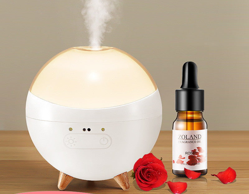 Coremet Ltd ultrasonic aroma diffuser and humidifier business kit with sleek design and control panel, ideal for enhancing office spaces.