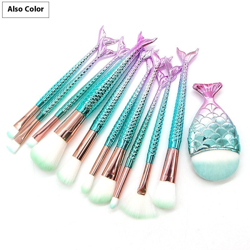 Set of 10 Mermaid-themed makeup brushes from Coremet Ltd, featuring colorful handles and soft bristle tips for beauty application.