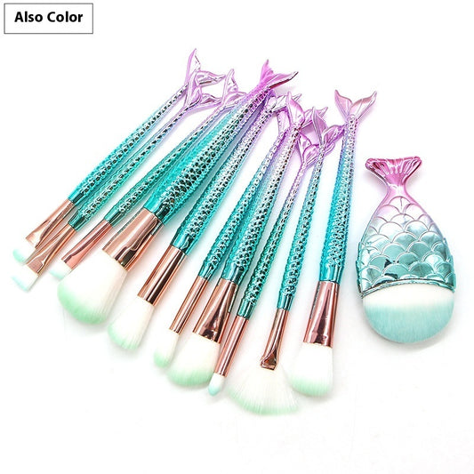 Set of 10 Mermaid-themed makeup brushes from Coremet Ltd, featuring colorful handles and soft bristle tips for beauty application.