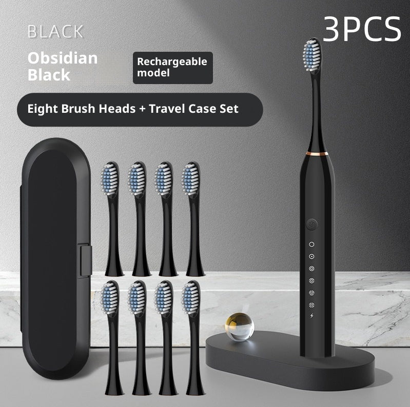 Coremet Ltd soft-bristle rechargeable electric toothbrush from business kit, showing the toothbrush with a sleek handle and brush head.