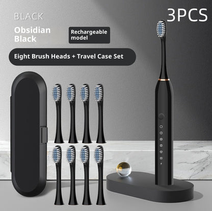 Coremet Ltd soft-bristle rechargeable electric toothbrush from business kit, showing the toothbrush with a sleek handle and brush head.